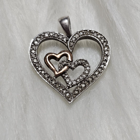 SIGNED SUN STERLING SILVER AND 14 K GOLD AND DIAMONDS HEART PENDANT